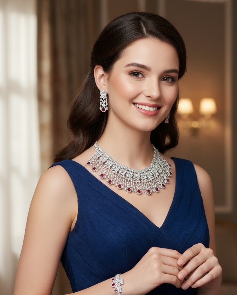 Woman wearing a minimalist gold jewelry set with necklace, bracelet, and earrings