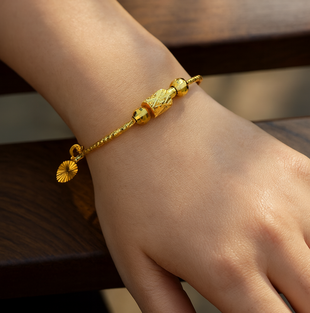 Minimalist gold charm bracelets collection featuring elegant handcrafted designs